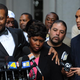 Wanda Johnson, Grant's mother, mourns her son. (Getty)